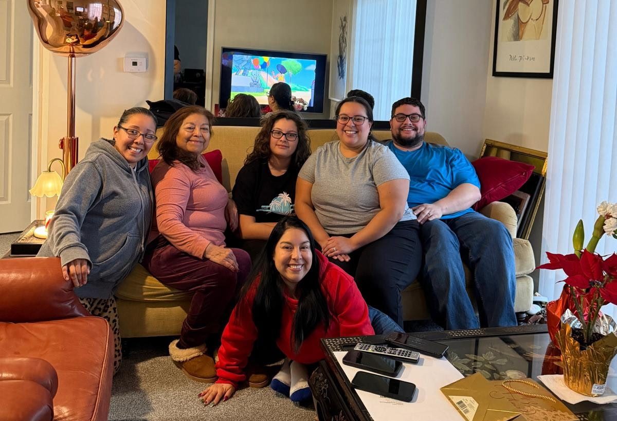 Jessica with her family at home